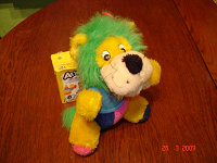 Отдается в дар мягкая игрушка--лев разноцветный