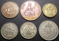 Отдается в дар Монеты Георга VI.