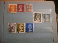 Отдается в дар почтовые марки с изображением королевы Елизаветы II