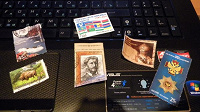 Отдается в дар Почтовые марки и дисконтные карты