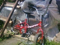 Отдается в дар красный велосипед двухколёсный