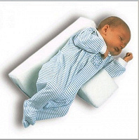 Отдается в дар Фиксатор-подушка для новорожденного