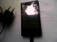 Отдается в дар Кпк HTC 4G Max (белый) черного цвета.