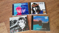 Отдается в дар CD-диски в коллекцию + подставка под диски