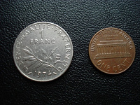 Отдается в дар 1 франк 1974 г и 1 цент США 1962 г