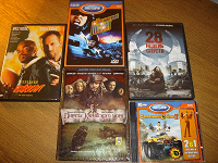 Отдается в дар DVD диски с фильмами и играми