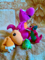 Отдается в дар мягкие игрушки-стадо динозавров