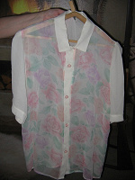 Отдается в дар Блуза размер50-52.