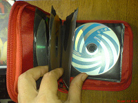 Отдается в дар Сумочка с кармашками для дисков + 10 шт. дисков