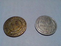 Отдается в дар монетка и жетон в метро