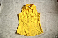 Отдается в дар желтая рубашка без рукавов