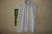 Отдается в дар белая блуза без рукавов