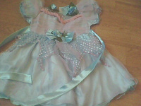 Отдается в дар Платье для девочки до 4 лет.дар от знакомых.Голубое с розовым оттенком.