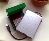 Отдается в дар USB-FDD + 4 дискеты