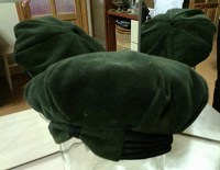 Отдается в дар шапка женская зимняя цвет тёмно-зеленый