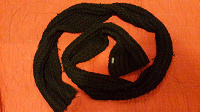 Отдается в дар Вязаный фирменный черный шарф.