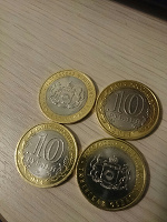 Отдается в дар Юбилейная монета 10 рублей Тюменская область 2014 г.