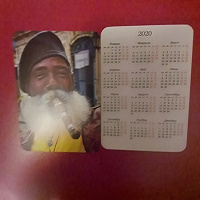 Отдается в дар Календарик мужчина с сигарой