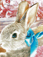Отдается в дар Кролик с цветами и лентой(календарик)