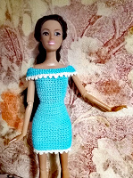 Отдается в дар Вязанное платье для Барби.