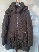 Отдается в дар Куртка теплая на зиму черная б\у 46р в приличном состоянии.