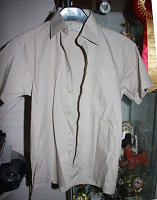 Отдается в дар Рубашка с коротким рукавом на мальчика, рост 146-152, р-р 33