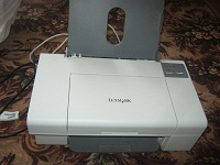 Отдается в дар подарю принтер Lexmark 730