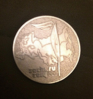 Отдается в дар Олимпийская монетка «Сочи-2014» ФАКЕЛ