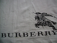 Отдается в дар футболка типа Burberry.