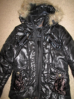 Отдается в дар чёрная женская куртка на 44-46 размер