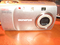Отдается в дар фотоаппарат OLYMPUS C-310 zoom