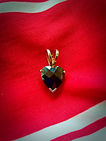 Отдается в дар Серебрянный кулон-сердце с черным камнем