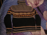Отдается в дар тёплый свитер на 42 размер