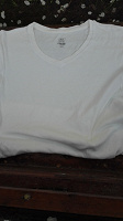 Отдается в дар футболка белая новая, унисекс.