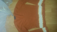 Отдается в дар Веселенький оранжевый свитер. Размер M
