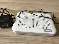 Отдается в дар ADSL роутер с wi-fi