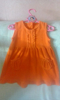 Отдается в дар Яркое плюшевое оранжевое платье на 1,5-2 года