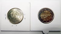 Отдается в дар 2 монеты по теме WWII