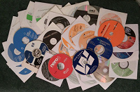 Отдается в дар CD/DVD-диски с программами.