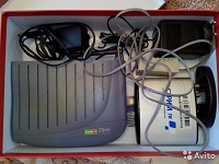 Отдается в дар Комплект приставка декодер TV AmiNET110 + WiFi модем ZTE ZXDSL 531B