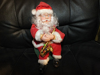Отдается в дар Санта-Клаус с саксофоном