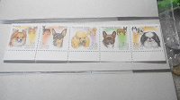 Отдается в дар Сцепка марок собачки