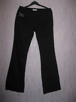 Отдается в дар Новые черные джинсы со стразами Look (S)