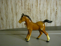 Отдается в дар Пластмассовая лошадка-брелок.