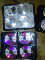 Отдается в дар UPD: Альбомы с DVD — художественные фильмы и сериалы
