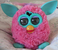 Отдается в дар Ферби Furby розовый с хохолком