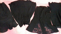 Отдается в дар 4 черные юбки-годе на 48-50р.
