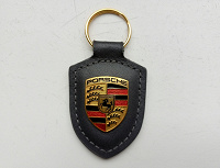 Отдается в дар Брелок новый " Porsche"