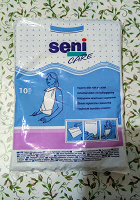 Отдается в дар Медицинские нагрудники защитные с карманом для взрослых немощных людей Seni для кормления