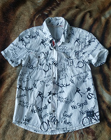 Отдается в дар Рубашка на мальчика р-134-140.